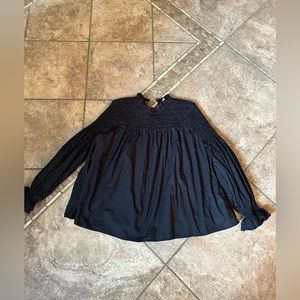Black long sleeve top by Anthropologie